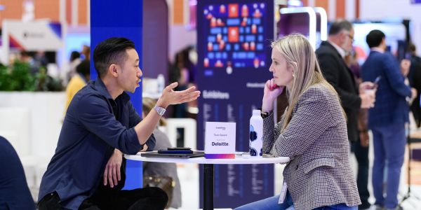 Photograph of a casual business meeting at the Transform Conference